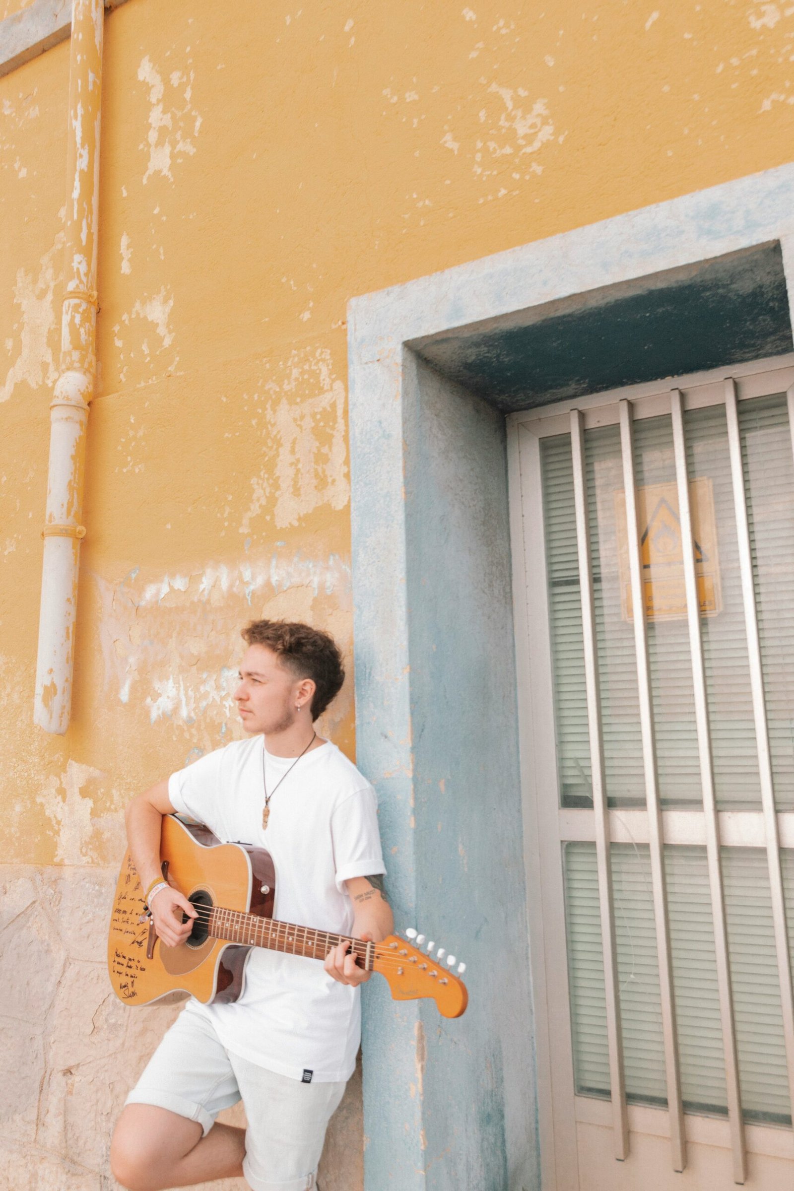 a man playing a guitar